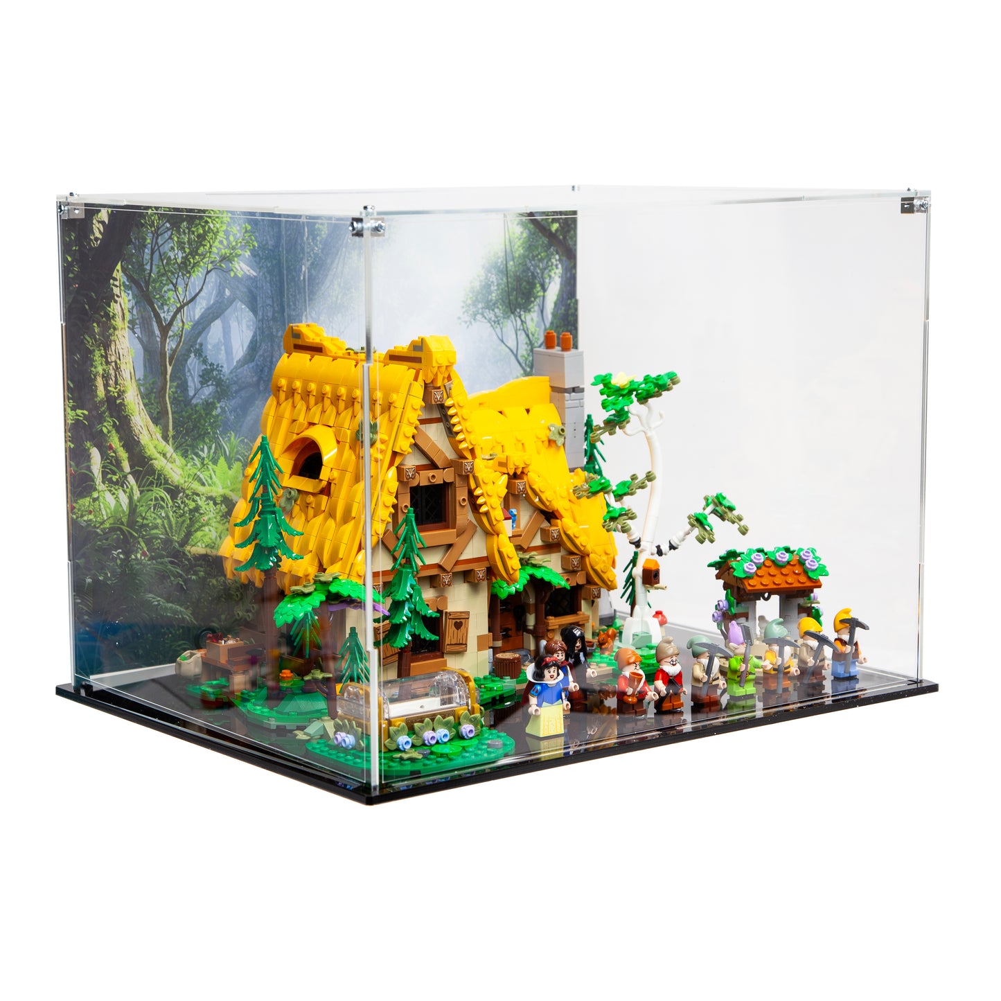 Close-up of laser-cut acrylic display case fitted to LEGO Snow White cottage set